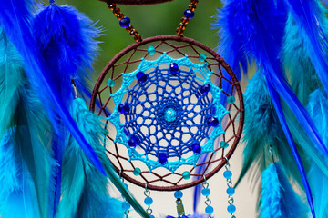 Handmade dream catcher with feathers threads and beads rope hanging