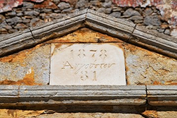 Greece, Symi island, lintel of old house with a sign reading  in the town of Symi, September 28 2008.