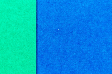 Fototapeta premium Abstract green and blue color paper textured background with copy space for design and decoration