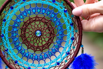Handmade dream catcher with feathers threads and beads rope hanging
