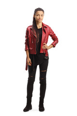 Full length portrait of a mixed race young female in a leather jacket