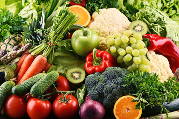 Naklejka na ściany i meble Assorted raw organic vegetables and fruits