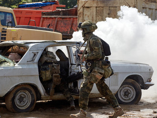 Special forces soldiers storm the car