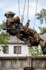 Special forces soldiers storm the walls