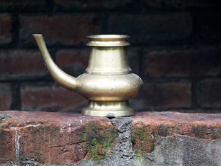 Fototapeta premium Kindi , a traditional bronze vessel used in Kerala for holding water