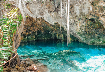 Crystal Clear blue water cenote in Mexico