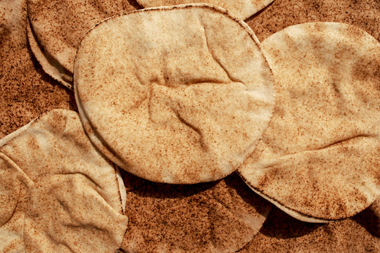 Background made of multigrain pita bread. Famous traditional Arabic flat bread. Egyptian bread.