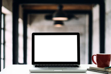 laptop on table.