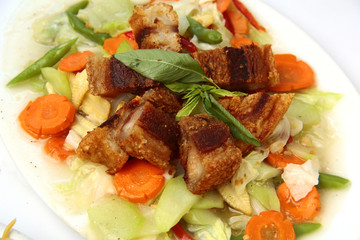 Filipino dish called Chopsuey topped with Lechon Kawali