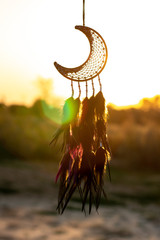 Handmade dream catcher with feathers threads and beads rope hanging