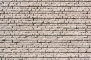 Brick wall background outside of the building.