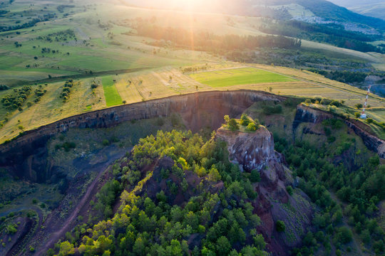 Volcanic crater of Racos village, Transylvania, Romania - drone view