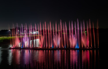 Night show of color fountains. Beautiful fountain show. Dancing fountain in Taiwan