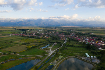Fototapeta na wymiar Carta village and the Fgaras mountains in Romania.