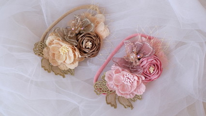 ouquet of flowers made out of fabric cloth textile in beautiful soft pastel pink and brown theme colors that can be used as hair accessory, decoration, and embellishment