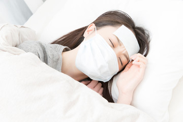 体調不良の女性