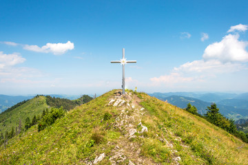 The summit cross of the Almkogel, a mountain in the Enns valley and highest summit of the Grossraming municipality