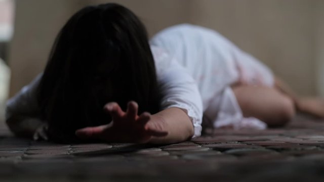 Zombie ghost woman in the dark house nightmare screaming halloween.