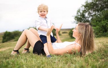 Happiness mother with her baby son on the day time