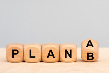 plan a and plan b printed on cubes