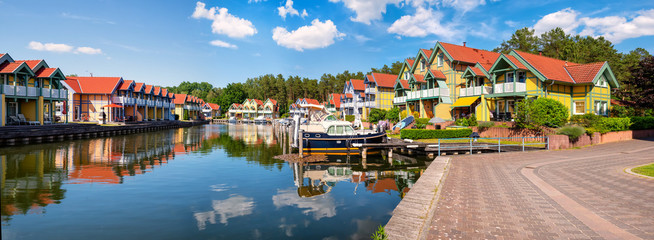 Harbor village Rheinsberg-Brandenburg with traditional houses on a sunny day in summer, Germany