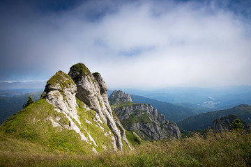 Most scenic mountain from Romania, Ciucas mountains in summer mist.