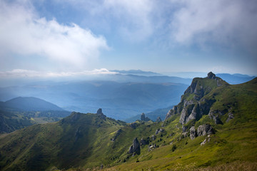 Fototapeta na wymiar Most scenic mountain from Romania, Ciucas mountains in summer mist.