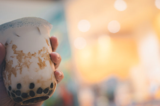 Man Is Holding A Glass Of Takeaway Bubble Milk Tea