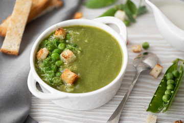 green pea puree soup with croutons