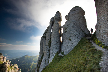 Young hiker backpacker in romanian Ciucas mountains.