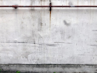 a photo of an old and worn white wall for background use
