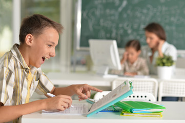 Portrait of children at school in the classroom