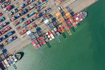 Obraz premium Container , container ship in export and import business and logistics. Shipping cargo to harbor by crane. Water transport International. Aerial view and top view.