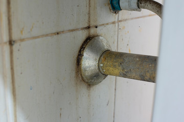 dirty white ceramic groove and drain