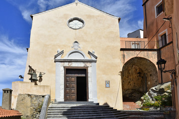 Fototapeta na wymiar The facade of a small church in Maierà, a rural village in the Calabria region.