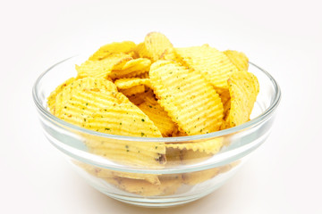 Potato chips with greens bowl isolated on white