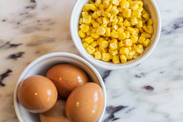 Bowl of corn and eggs