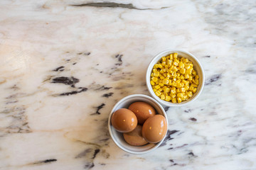 Bowl of corn and eggs