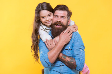 Fototapeta premium Father and happy little daughter having fun, joyful moment concept