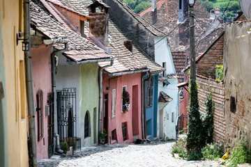 Beautiful colorful street in Sighisoara in typical traditional style. Sighisoara is the place Dracula is born.