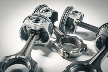 pistons with connecting rod engine car on white background. Close up