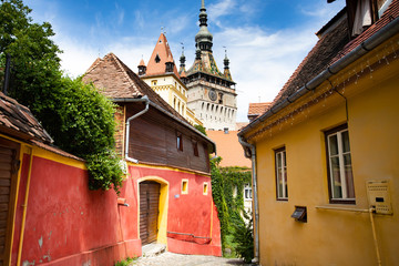 Beautiful colorful street in Sighisoara in typical traditional style. Sighisoara is the place...