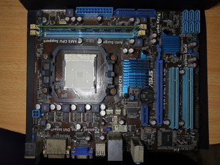 Computer Hardware. Motherboard, A close-up microchip with many electrical components placed on the...