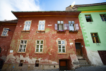 Beautiful colorful street in Sighisoara in typical traditional style. Sighisoara is the place...