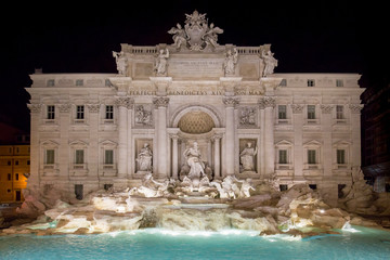 Beautiful view of the Trevi Fountain at night. The largest baroque Fountain di Trevi in the city and one of the most famous fountains in the world located in Rome, Italy