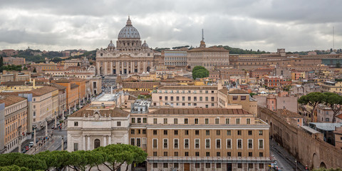 View of St. Peter's Basilica in the Vatican. Rome cityscape with the dome of St. Peter's Basilica  -  state of religion Christianity, Italy