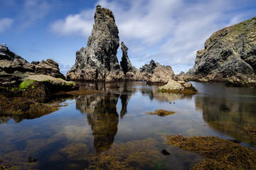 Landscape of Belle-île-en-mer, Morbihan, Brittany / Bretagne, France. Rocks and cliffs at the coast on the cote sauvage (wild coast). 