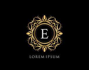 Fototapeta premium Gold Badge E Letter Logo. Luxury calligraphic vintage emblem with beautiful classy floral ornament. Vintage Frame design Vector illustration.