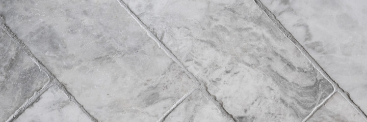 Panorama of gray floor tiles