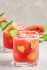 Summer festive drinks watermelon cucumber mojito. Space for text.